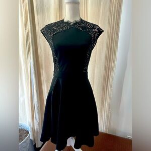 Women’s black dress, brand Ted Baker, size s with lace on the sleeves